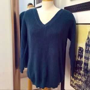 Miracle blue/green lace up back V-neck sweater.